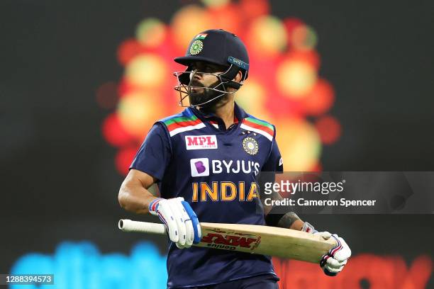 Virat Kohli of India leaves the field after being dismissed by Josh Hazlewood of Australia during game two of the One Day International series...