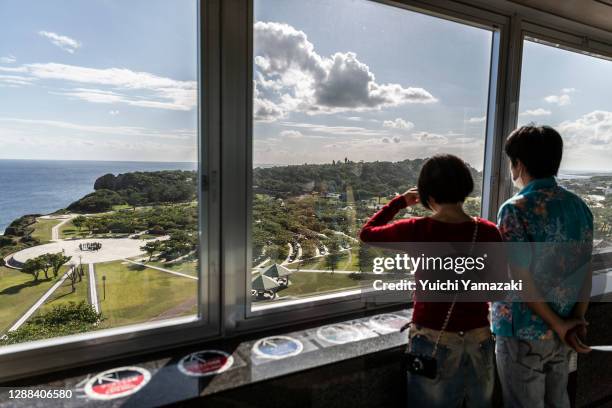 People look at the scenery from an observatory in the Peace Memorial Park on November 29, 2020 in Itoman, Japan. September 2 marks the 75th...