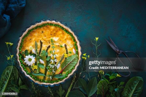 quiche lorraine savory tart vegan with raw vegetables creating a green garden - baked vegetables stock pictures, royalty-free photos & images