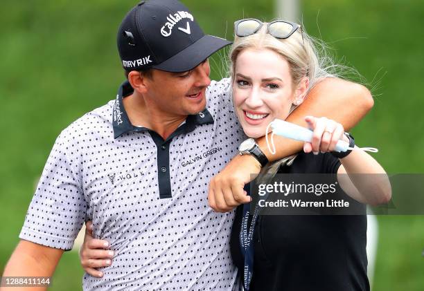 Christiaan Bezuidenhout of South Africa is congratulated by his fiancée Kristen Hart after winning the Alfred Dunhill Championship at Leopard Creek...