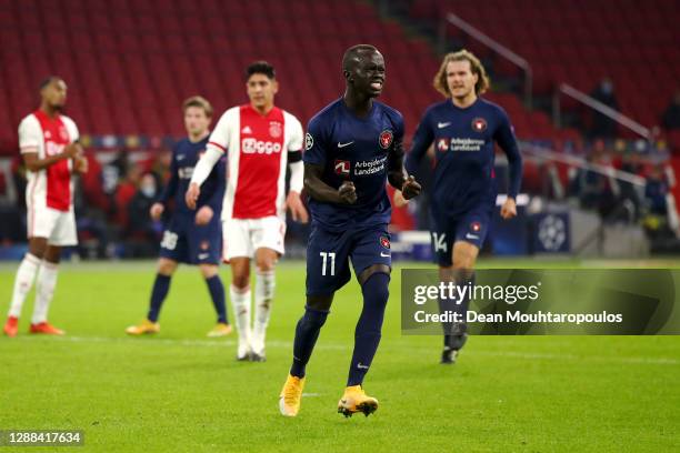 Awer Mabil of FC Midtjylland takes and scores a penalty during the UEFA Champions League Group D stage match between Ajax Amsterdam and FC...