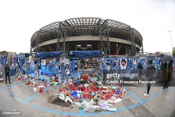 Tributes are seen to the deceased Diego Maradona outside the stadium prior to the Serie A match between SSC Napoli and AS Roma at Stadio San Paolo on...