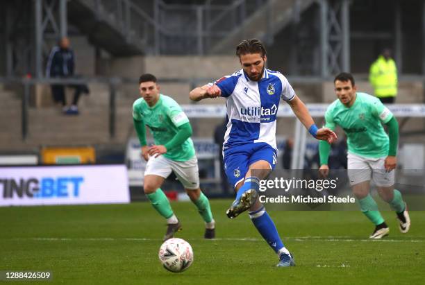 Luke Leahy of Bristol Rovers scores their sides fifth goal from the penalty spot during the Emirates FA Cup Second Round match between Bristol Rovers...