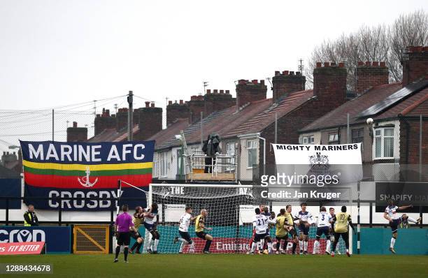 General view of play during the Emirates FA Cup Second Round match between Marine FC and Havant and Waterloovile at The Marine Travel Arena on...
