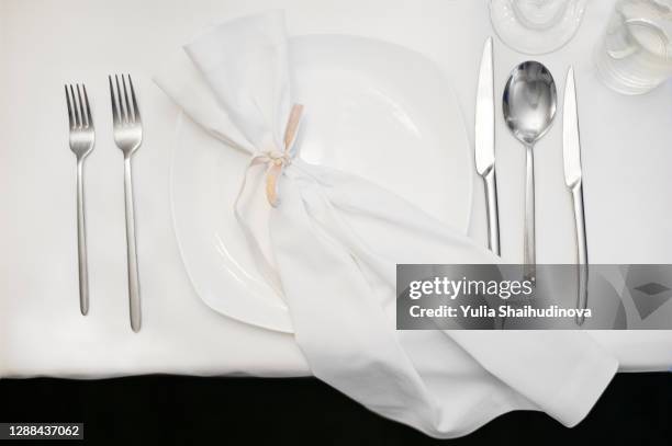 white table set - napkin holder stock pictures, royalty-free photos & images
