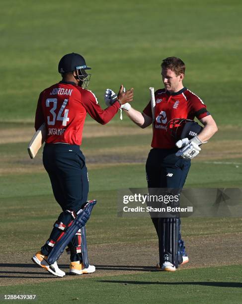 Chris Jordan of England and Eoin Morgan of England celebrate as the winning runs are hit during the 2nd T20 International match between South Africa...