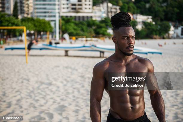 shirtless afro athlete on the beach - most handsome black men stock pictures, royalty-free photos & images