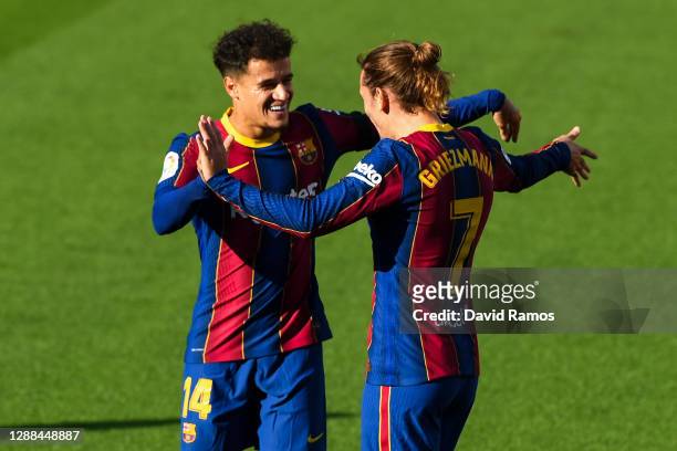 Antoine Griezmann of FC Barcelona celebrates with his team mate Philippe Coutinho after scoring his team's second goal during the La Liga Santander...