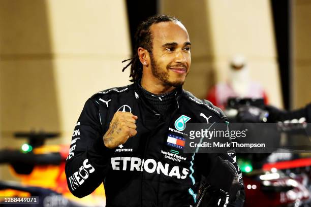 Race winner Lewis Hamilton of Great Britain and Mercedes GP celebrates in parc ferme during the F1 Grand Prix of Bahrain at Bahrain International...