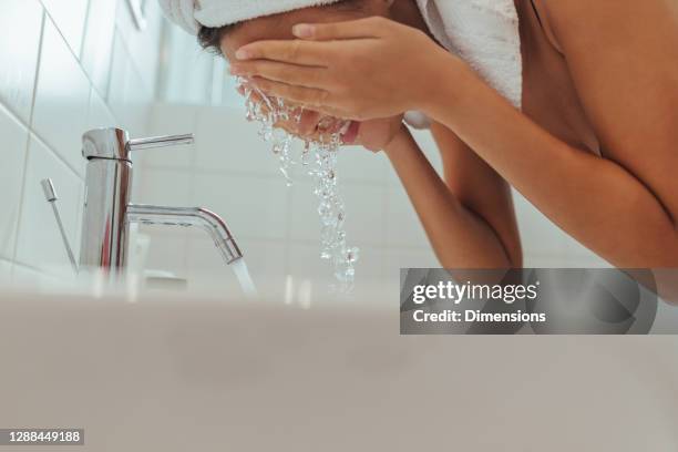 clean water is all you need - female facial expressions stock pictures, royalty-free photos & images