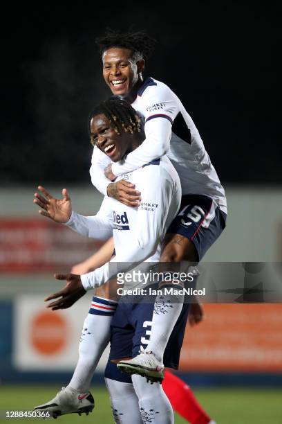 Calvin Ughelumba of Rangers celebrates with Bongani Zungu after scoring their team's second goal during the Betfred Cup match between Falkirk and...