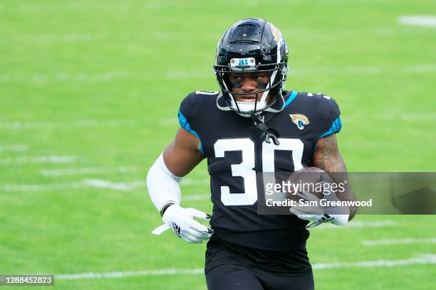 James Robinson of the Jacksonville Jaguars warms up prior to their game against the Cleveland Browns at TIAA Bank Field on November 29, 2020 in...