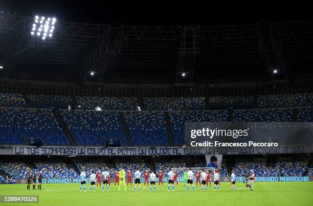 Players observe a minutes silence for former footballer, Diego Maradona, who recently passed away prior to during the Serie A match between SSC...