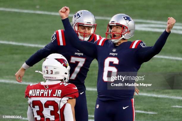 Nick Folk of the New England Patriots celebrates after kicking a 50 yard game winning field goal against the Arizona Cardinals during the fourth...