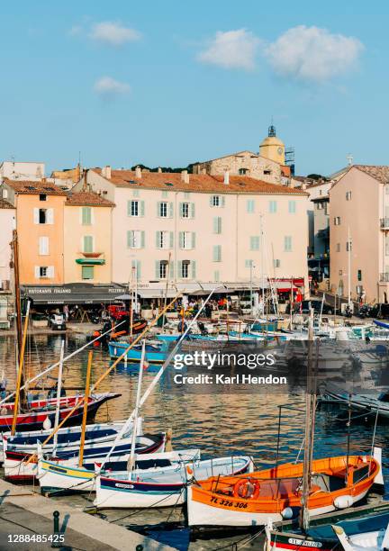 st.tropez harbour at sunset - stock photo - saint tropez stock-fotos und bilder