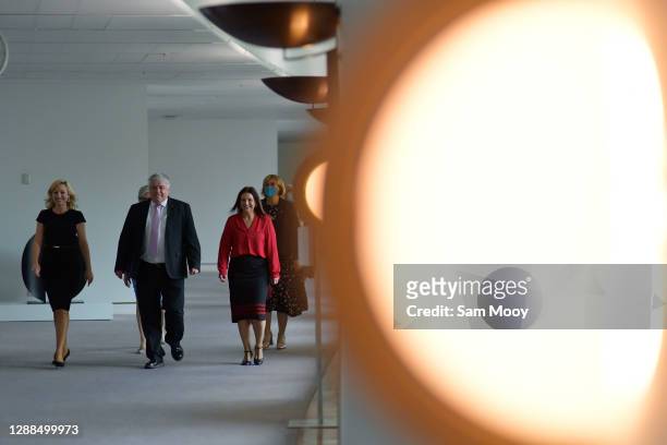 Greens Senator Larissa Waters and Senate crossbench members Rex Patrick and Jacqui Lambie arrive to speak to media in the Press Gallery at Parliament...