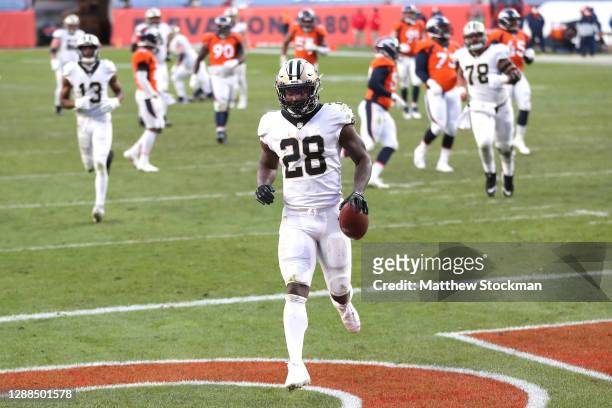 Latavius Murray of the New Orleans Saints rushes for a 36 yard touchdown during the third quarter of a game against the Denver Broncos at Empower...