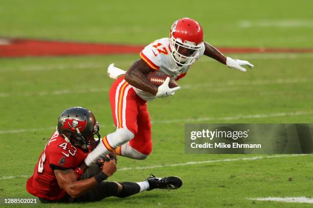 Mecole Hardman of the Kansas City Chiefs attempts to break a tackle from Ross Cockrell of the Tampa Bay Buccaneers during their game at Raymond James...