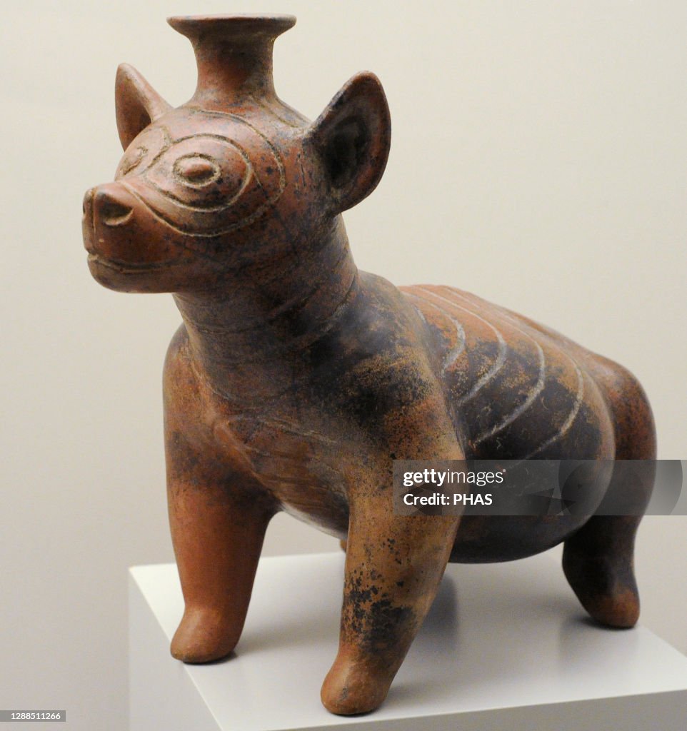 Dog shaped vessel.