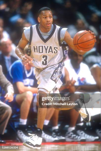 Allen Iverson of the Georgetown Hoyas dribbles up court during a college basketball against the Memphis Tigers at MCI Center on February 17, 1996 in...