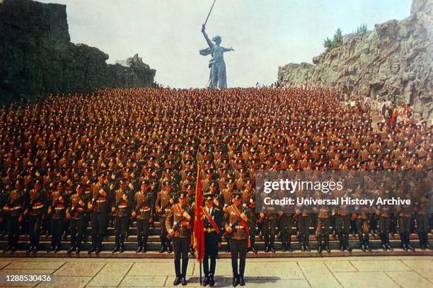 Soviet troops at the Motherland monument to the hero's of the Battle of Stalingrad. Volgograd.