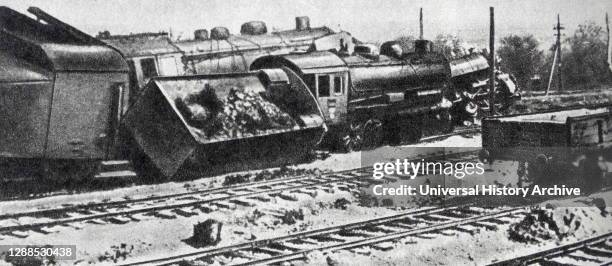 Partisans sabotage a train in Poland, 1943.