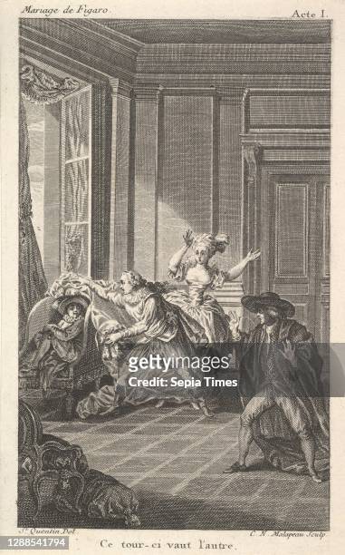 Man curled up in a chair looks toward another man who approaches him from the left in an interior setting, a woman and a man stand nearby with their...