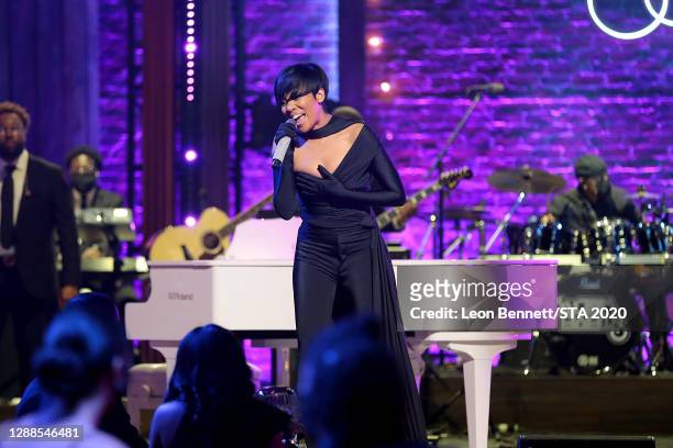 In this image released on November 29th, Monica performs during the 2020 Soul Train Awards presented by BET.