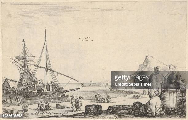 Ship disembarking to left, two galley slaves stand and one sits next to a barrel to right, various other figures on the shore, a mountain to right in...