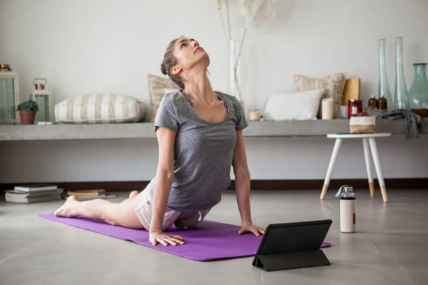 Woman doing yoga indoors