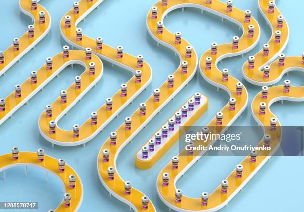 covid-19 vaccine loop - conveyor belt stock pictures, royalty-free photos & images