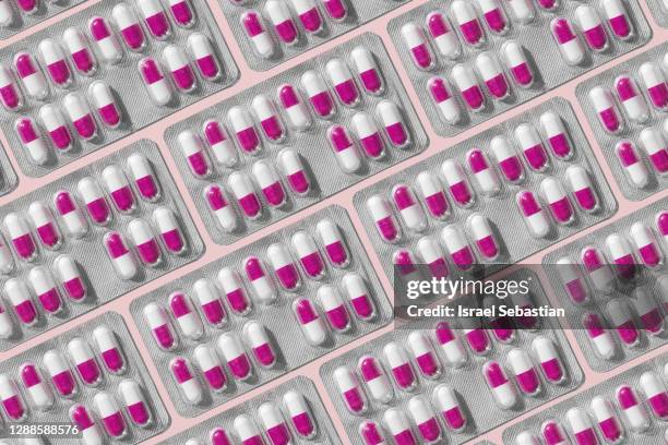 from above pill blister pack on a table pattern - blister pack stock-fotos und bilder