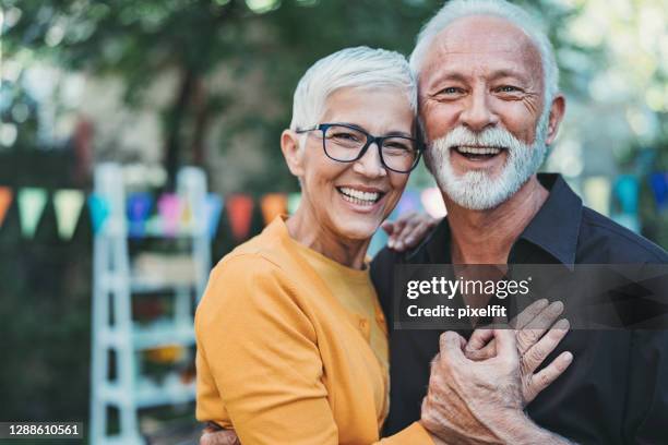 loving senior couple - couple celebrating stock pictures, royalty-free photos & images