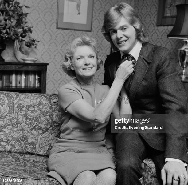 English actress Anna Neagle with Australian actor and singer John Farnham, her co-star in the stage musical 'Charlie Girl', UK, 1971.