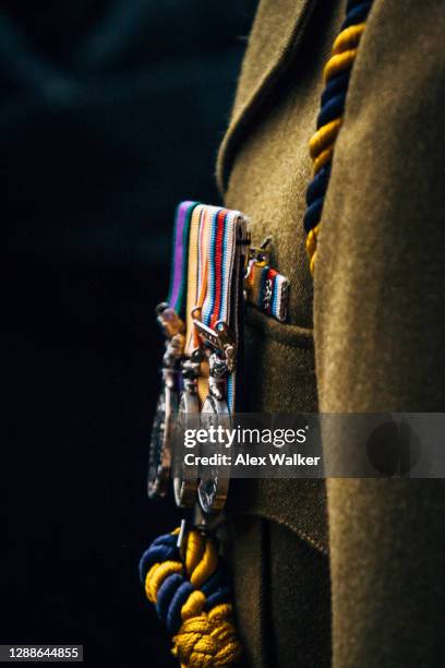 close up of war medals on jacket - conmemorativo de guerra fotografías e imágenes de stock