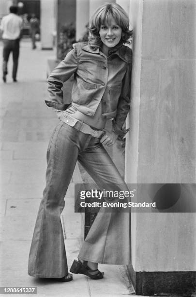 Model Bertie wearing a denim jacket and flared trousers at a preview of the Miss Levi spring collection at the Sonesta Tower Hotel, London, UK, 14th...