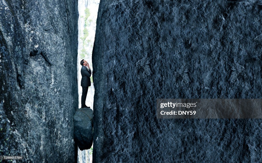 Stuck Between A Rock And A Hard Place