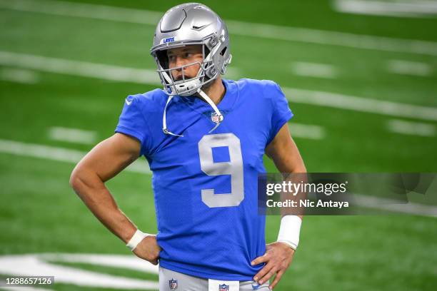 Matthew Stafford of the Detroit Lions looks on while warming up before the game against the Houston Texans at Ford Field on November 26, 2020 in...