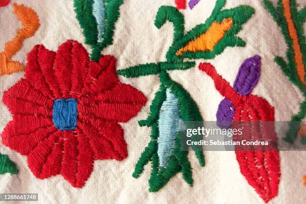 natural embroidery with flowers and branches, traditional in rural country. - embroidery stock pictures, royalty-free photos & images