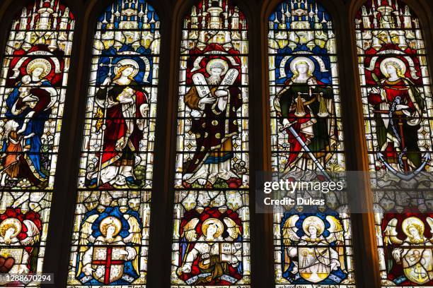 England, Somerset, Bath, Bath Abbey, Stained Glass Window depicting Various Saints.