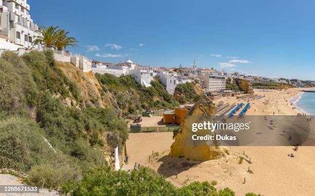 Solitary rock at the Praia do Peneco, Albufeira, Portugal.