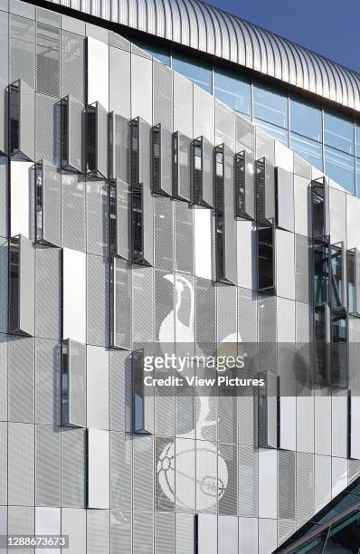 Steel mesh cladding and iconic cockerel logo. The New Tottenham Hotspur Stadium, London, United Kingdom. Architect: Populous, 2019.