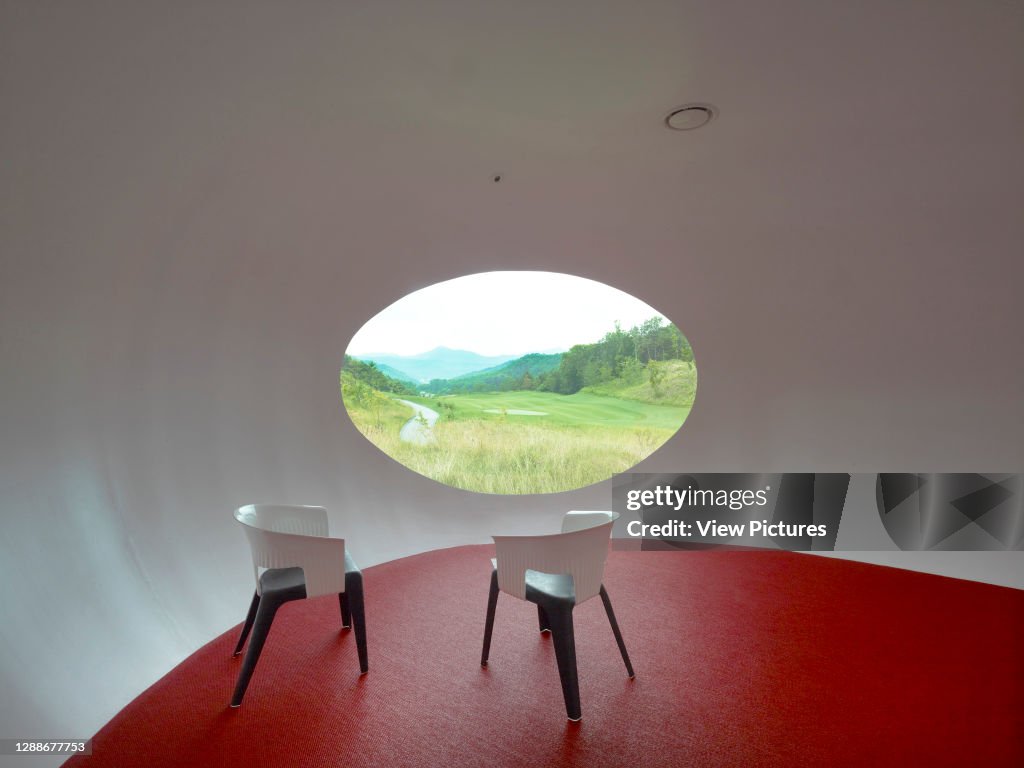 Whistling Rock Golf Clubhouse, Chuncheon, Korea, South. Architect: Mecanoo, 2012. Minimal teahouse interior with oval lookout.