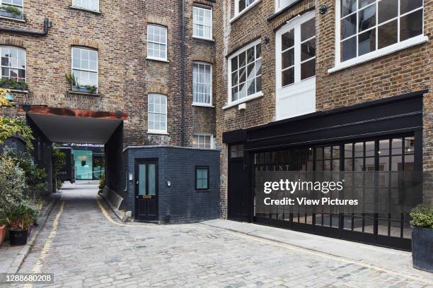 Oblique elevation of showroom in mews. Joyce Wang Showroom, London, United Kingdom. Architect: n/a, 2018.