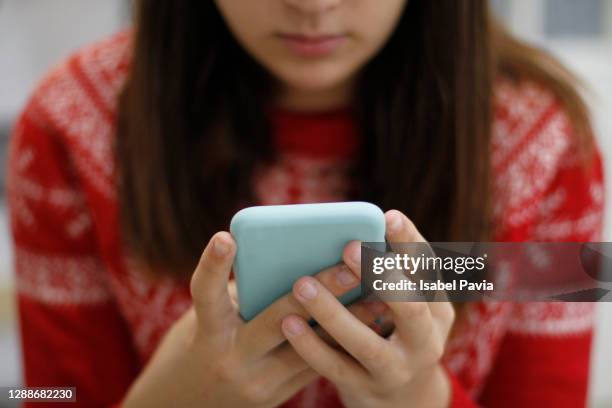 young woman using smart phone - digital detox stock pictures, royalty-free photos & images