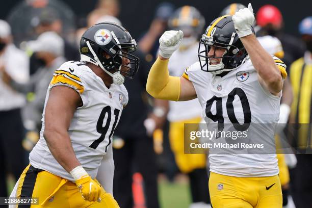 Stephon Tuitt and T.J. Watt of the Pittsburgh Steelers reacts after sacking Jake Luton of the Jacksonville Jaguars during the second half at TIAA...