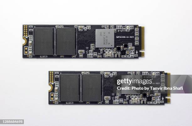 nvme m.2 ssd drive laying white background - floppy disk drives stock pictures, royalty-free photos & images