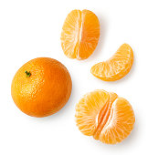 Fresh ripe whole and sliced mandarin, tangerine or clementine