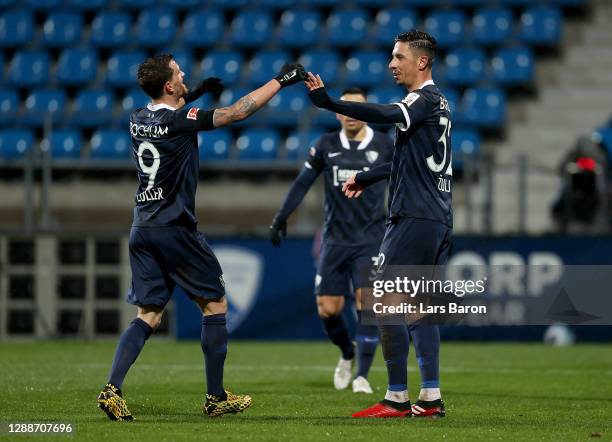 Robert Žulj of Bochum celebrate with team mate Simon Zoller after scores his team's 4th goal during the Second Bundesliga match between VfL Bochum...