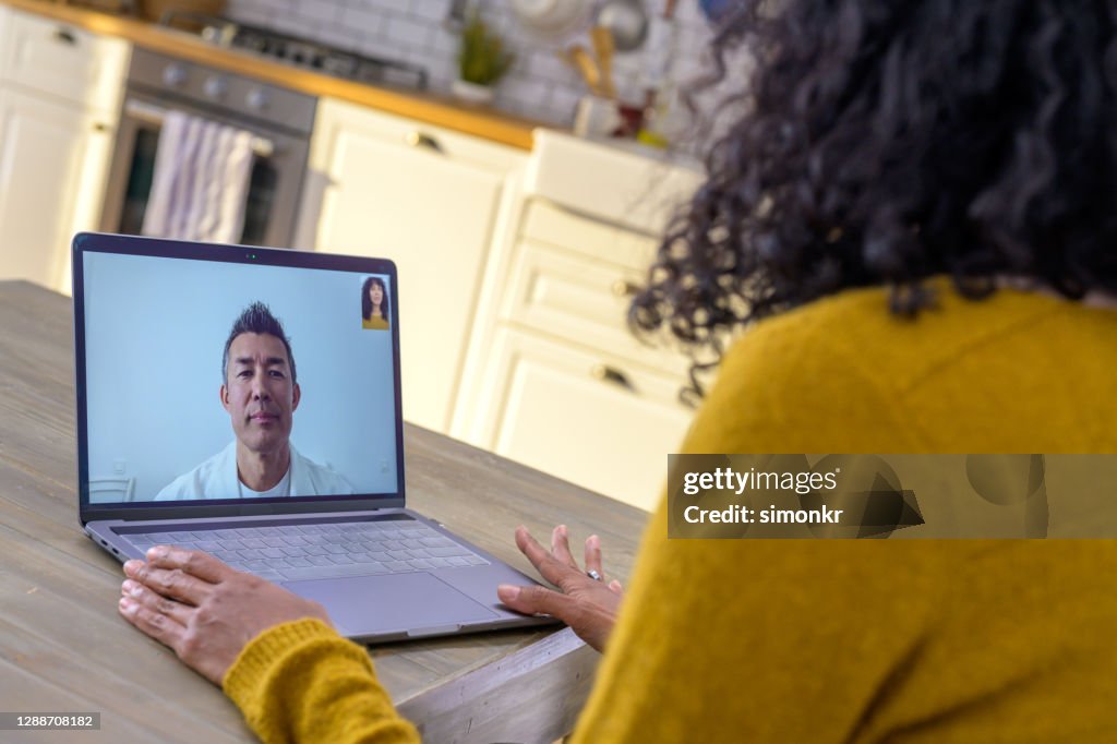Wife talking with her husband on video call